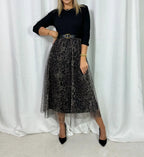 Maxi jurk met zwarte ribstof top en panterprint rok