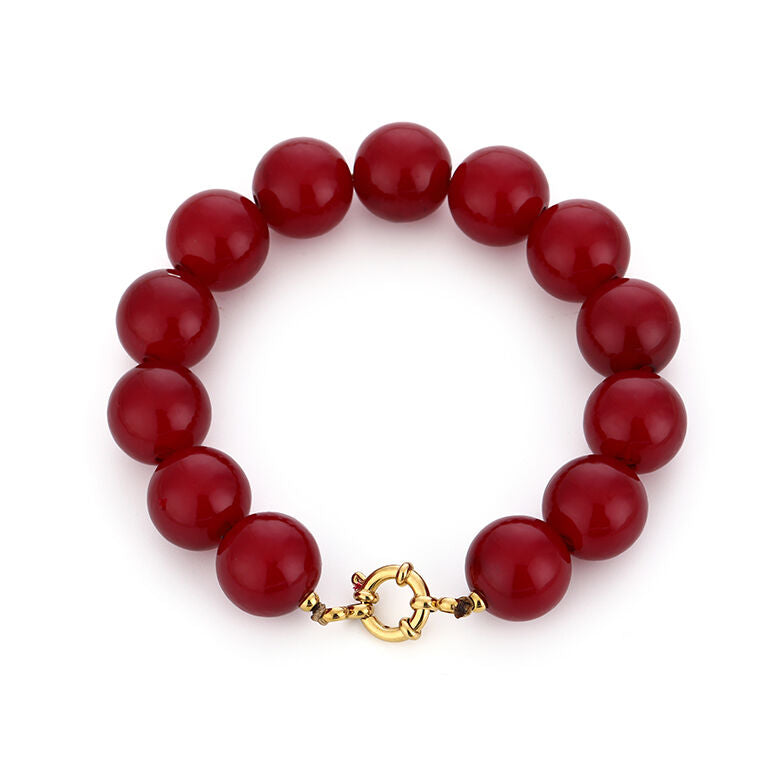 Kralen armband burgundy (bordeaux) met goudkleurig stainless steel detail. Damesarmband.