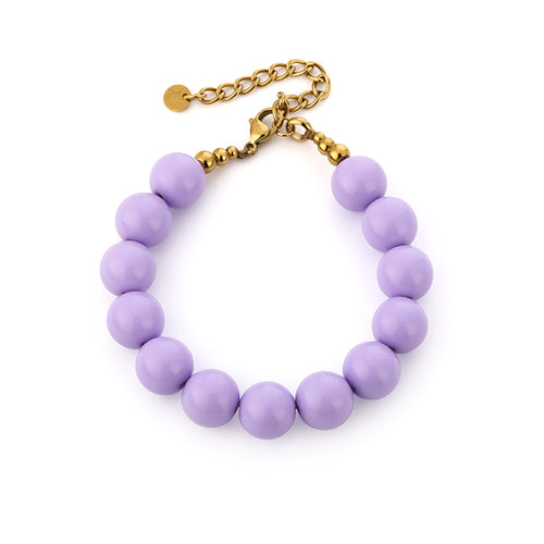 Lila paarse kralen armband met goudkleurig stainless steel deel. Verstelbare ketting.
