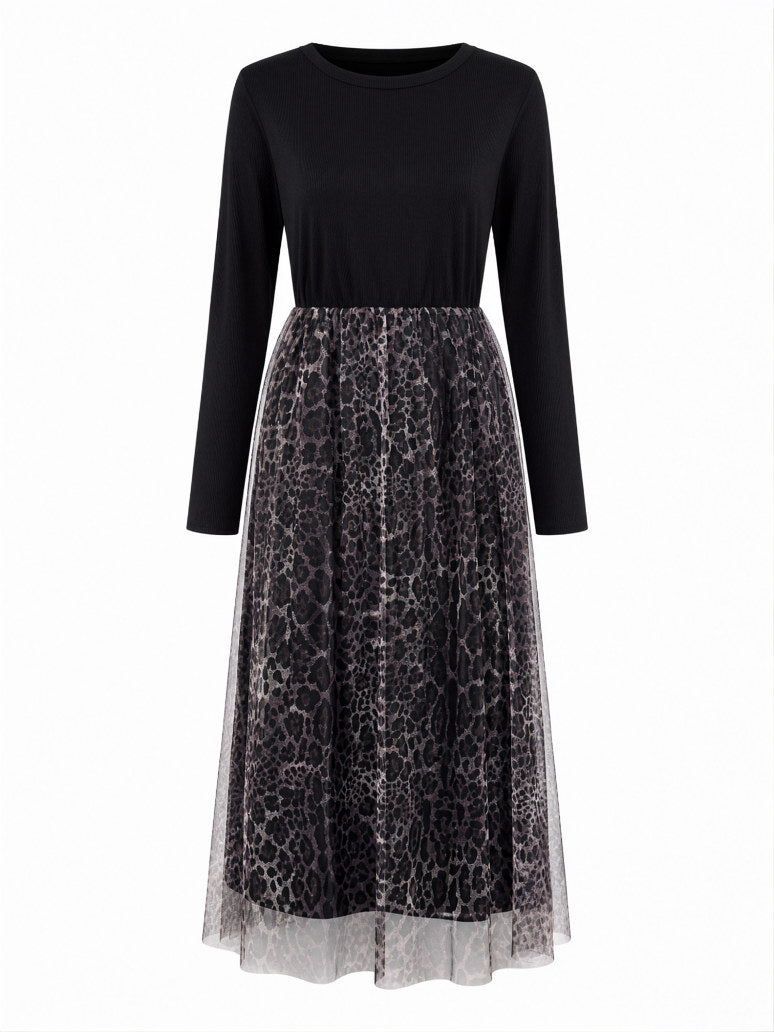 Maxi jurk met zwarte ribstof top en panterprint rok