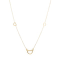 Goudkleurige stainless steel hartjes ketting met 5 open hartjes – perfect als gouden ketting look.